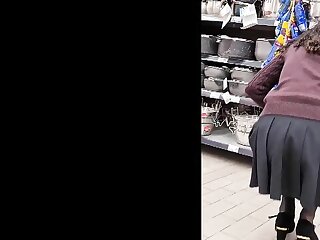 short skirt girl in supermarket